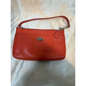 Coach Corner Zip Wristlet In Pebbled Leather Red Orange